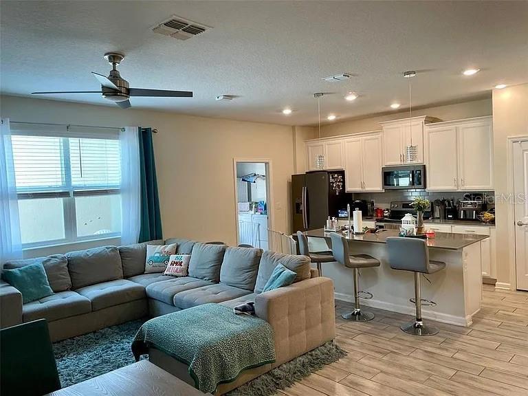 Photo of 3120 Aqua Virgo Loop #37, Orlando, FL 32837 (MLS # O6446918)