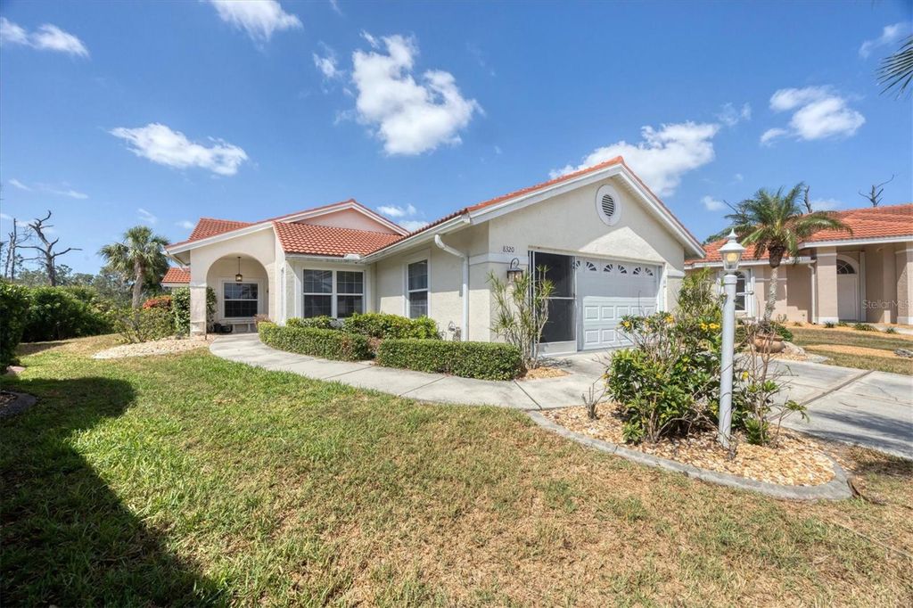 Photo of 8320 Creekview Lane, Englewood, FL 34224 (MLS # D6144812)