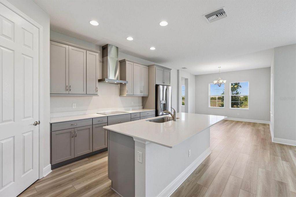 Photo of 9711 Surrey Rose Drive, San Antonio, FL 33576 (MLS # TB8435280)