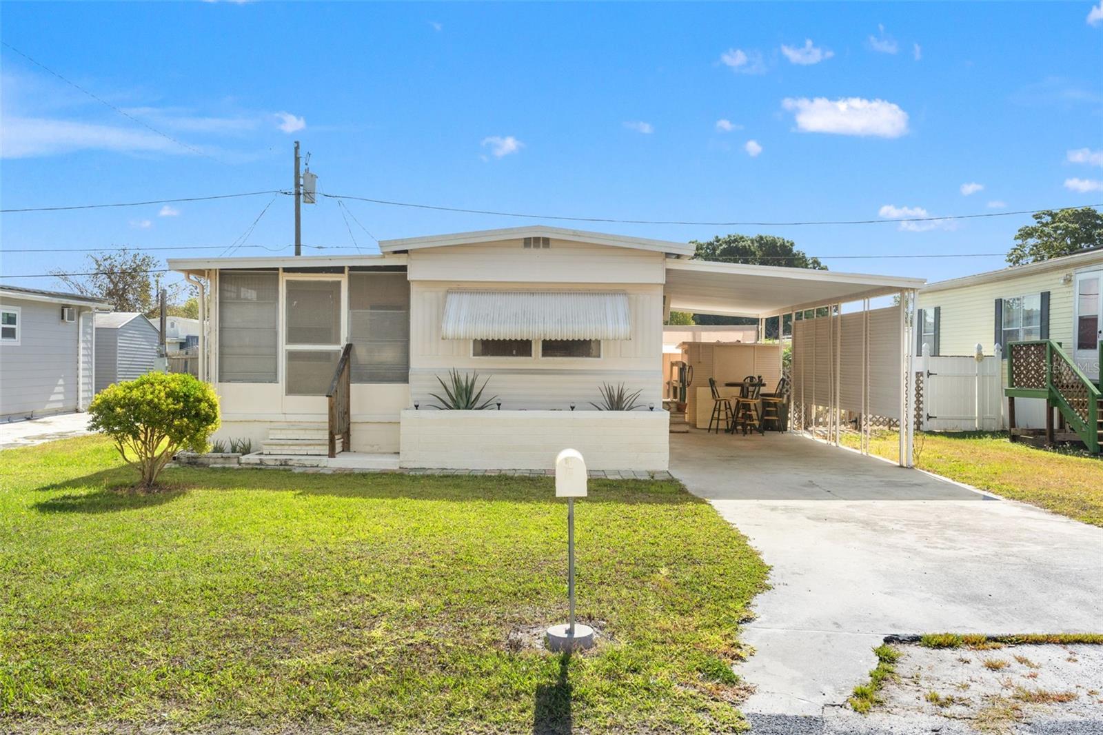 Large Price Reduction! Priced to sell fast! Welcome to 1810 Speck Dr., a solid and well-maintained home in the heart of Holiday, FL. This move-in ready property is the perfect snowbird escape or year-round Florida residence, offered mostly furnished so you can simply bring your suitcase and start enjoying right away. Inside, you’ll find an updated kitchen with newer cabinetry and a stainless steel fridge, two separate sitting areas for added flexibility, and in-house laundry for everyday convenience. The layout is smart and versatile. While officially a one-bedroom, the home includes a second room with a closet that’s perfect for visiting grandkids or guests. The main bedroom is generously sized, and the flooring throughout is in excellent condition—solid underfoot, with no soft spots to worry about. Two storage sheds out back provide all the room you need for tools, bikes, or seasonal decor, and the shaded patio area offers a private spot to relax and enjoy Florida's sunshine. This home is tucked inside the established Buena Vista neighborhood—a friendly, walkable community where neighbors still look out for each other. It did not experience flooding during last year’s hurricanes, offering peace of mind. Best of all, you’re just minutes from the famous Tarpon Springs Sponge Docks, where you can enjoy waterfront dining, quaint shops, and one of the most charming historic districts on the Gulf Coast. Homes like this don’t come along often—especially at this price. Schedule your private showing today before it’s gone.