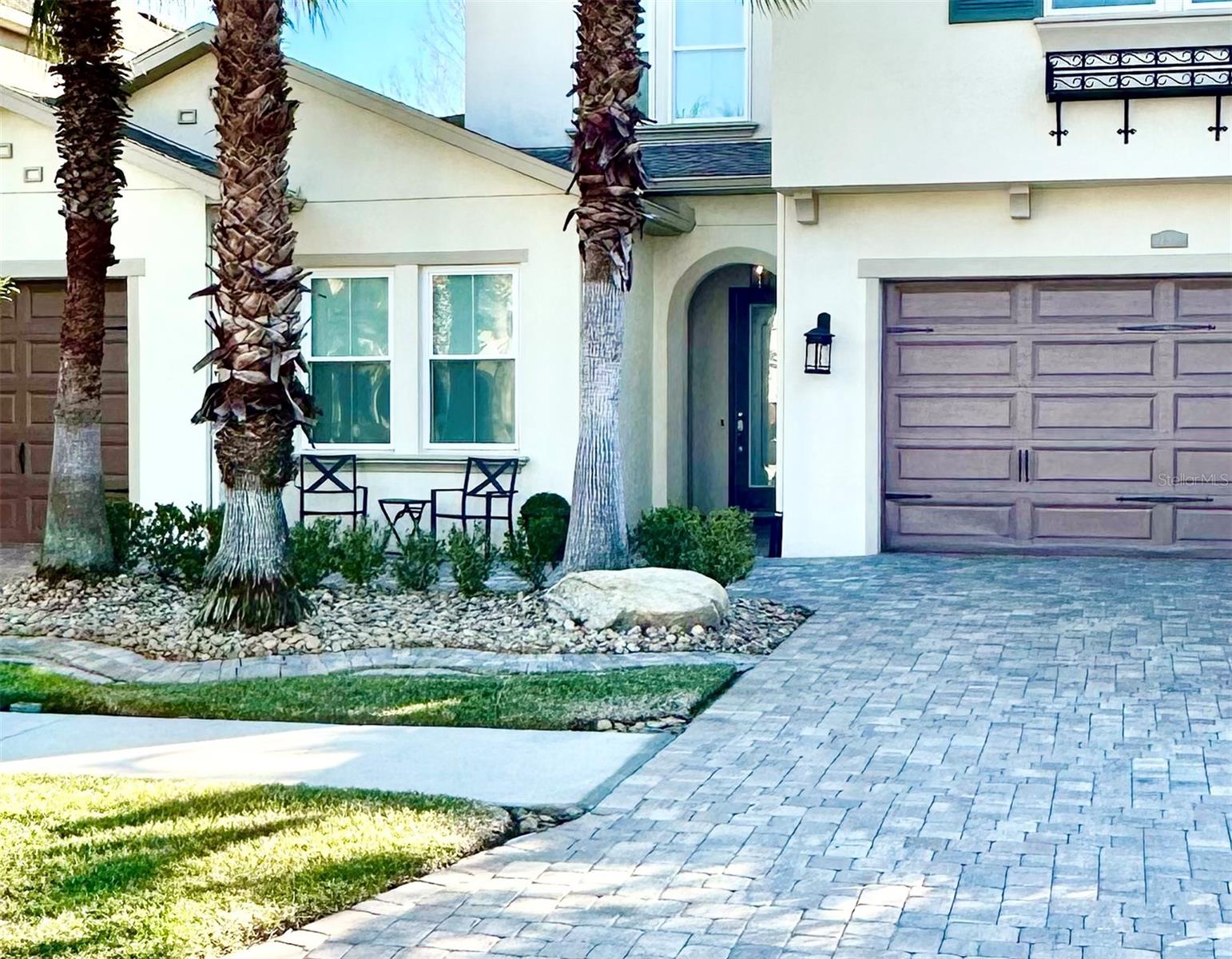 Retreat in CARROLLWOOD is a gated community with low HOA. This Brentwood 4/3 floor plan has formal dining room, bonus room, desk/office space, and a beautifully landscaped Lanai outdoor space. Primary bedroom has sitting space, door to lanai, and en-suite bath with separate vanities, separate tub & shower, and large custom closet. 2nd guest bedroom or office also on first floor, and full bath. 2 bedrooms, full bath, and large bonus room on second floor. All bedrooms have custom closets. Kitchen has quartz countertops, stainless steel appliances, island can seat 6, and breakfast table area. Outdoor lanai has covered table for al fresco with a TV for the game. ODK has Big Green Egg, 2 Burner Range, and Refrigerator. Outdoor fireplace for s’mores, and a fountain for ambiance day and night. Dog run on one side. Both garages have storage racks. One car garage has Tesla charger. All TVs and refrigerators included. Furniture and art negotiable. Conveniently located in the heart of Tampa, close to all highways, Airport, Busch Gardens, Raymond James Stadium, Amalie Arena, Downtown, Armature Works. Good school district. Very close to CARROLLWOOD Day School (CDS), an all IB (International Bacclaurette) school, grades 1-12, with PreK/Kindergarden on a separate campus nearby, and Corbett Prep that has Prek-8th grade, also IB. Home is NOT in flood zone and never had hurricane damage. HOA is $150/month.