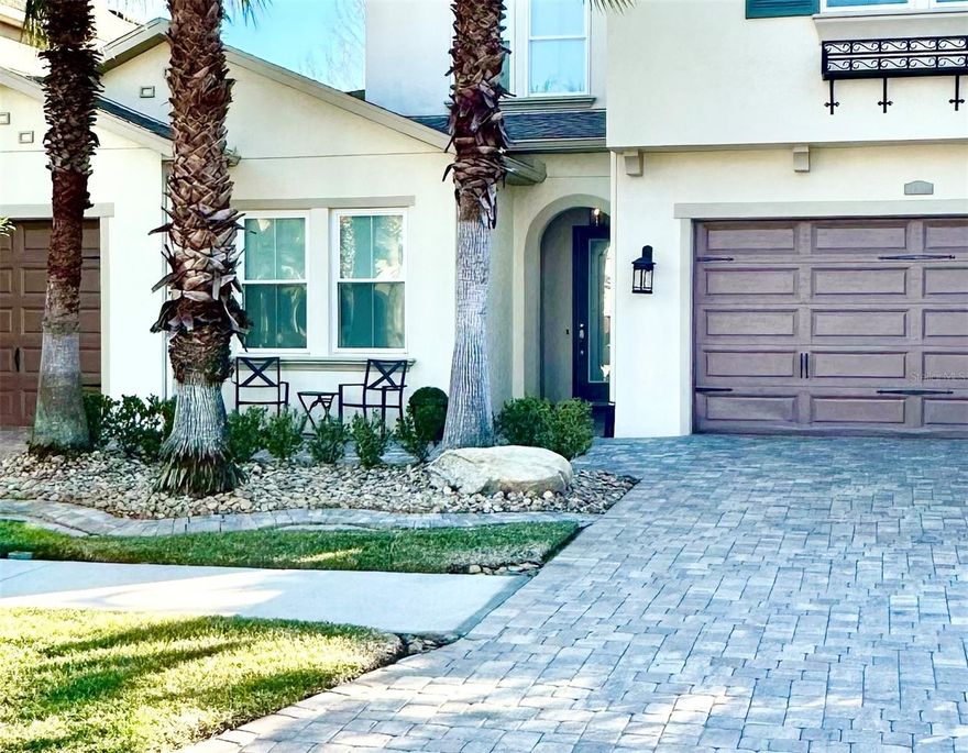 Retreat in CARROLLWOOD is a gated community with low HOA. This Brentwood 4/3 floor plan has formal dining room, bonus room, desk/office space, and a beautifully landscaped Lanai outdoor space. Primary bedroom has sitting space, door to lanai, and en-suite bath with separate vanities, separate tub & shower, and large custom closet. 2nd guest bedroom or office also on first floor, and full bath. 2 bedrooms, full bath, and large bonus room on second floor. All bedrooms have custom closets. Kitchen has quartz countertops, stainless steel appliances, island can seat 6, and breakfast table area. Outdoor lanai has covered table for al fresco with a TV for the game. ODK has Big Green Egg, 2 Burner Range, and Refrigerator. Outdoor fireplace for s’mores, and a fountain for ambiance day and night. Dog run on one side. Both garages have storage racks. One car garage has Tesla charger. All TVs and refrigerators included. Furniture and art negotiable. Conveniently located in the heart of Tampa, close to all highways, Airport, Busch Gardens, Raymond James Stadium, Amalie Arena, Downtown, Armature Works. Good school district. Very close to CARROLLWOOD Day School (CDS), an all IB (International Bacclaurette) school, grades 1-12, with PreK/Kindergarden on a separate campus nearby, and Corbett Prep that has Prek-8th grade, also IB. Home is NOT in flood zone and never had hurricane damage. HOA is $150/month.