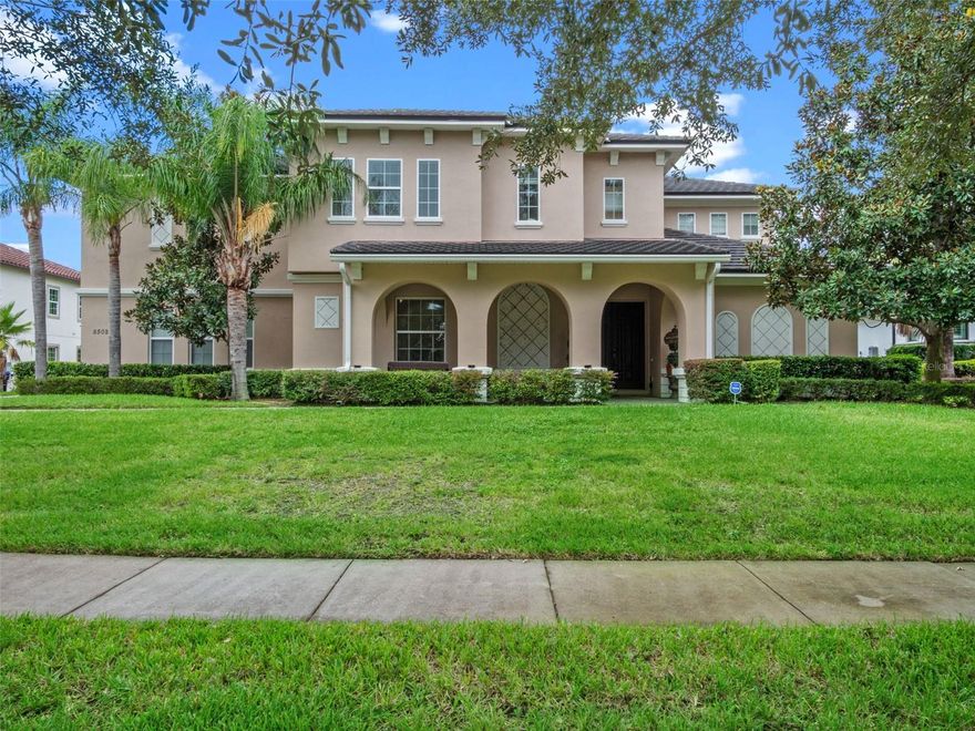 Behind the secure, monitored gates of Lake Davis Reserve lies a rare opportunity to own one of only eighteen custom estate homes in this exclusive enclave. Set on more than half an acre, this impressive six-bedroom residence spans over 6,300 square feet and was designed to deliver both sophistication and comfort for the most discerning buyer.
From the moment you step inside, the attention to detail is unmistakable. Expansive rooms, high-end finishes, and thoughtful design create a home that feels as luxurious as it is livable. The chef’s kitchen offers abundant cabinet and counter space, a large prep island, and a vented cooktop, opening seamlessly to the living areas. The home is designed with flexibility in mind, providing a primary suite and an ensuite bedroom on each floor, along with additional oversized bedrooms so no one is ever left wanting for space.
Upstairs, a grand bonus room measuring 33 by 25 feet becomes the centerpiece for entertaining, complete with a built-in bar and wine room. For those who appreciate cinema-quality evenings at home, the dedicated multi-level theatre room is an extraordinary addition. Wood tread stairs, crown molding, Ashland pattern travertine stone flooring, and a tile roof all elevate the craftsmanship throughout.
Step outside to a covered lanai with remote-controlled screens, overlooking the private backyard retreat. The saltwater pool and spa, heated for year-round enjoyment, reach depths of eight feet and are surrounded by extended decking that makes gatherings feel effortless. Whether hosting friends or savoring quiet evenings, this outdoor setting is a perfect complement to the interior living spaces.
Lake Davis Reserve is one of the area’s most coveted gated communities, prized not only for its privacy and exclusivity but also for its unmatched location. Just around the corner sits Windermere Preparatory School, Windermere High School, and zoning for the highly sought-after Windermere Elementary. In minutes, you can reach the magic of Disney, the convenience of the 429 expressway, and an endless selection of shopping and dining destinations.
Opportunities to own in Lake Davis Reserve are exceedingly rare, and building new at this scale and quality would be nearly impossible at today’s costs. This home represents exceptional value in a neighborhood where homes seldom come available. If you’ve been waiting for a property that combines space, luxury, privacy, and location in one, your search is over.