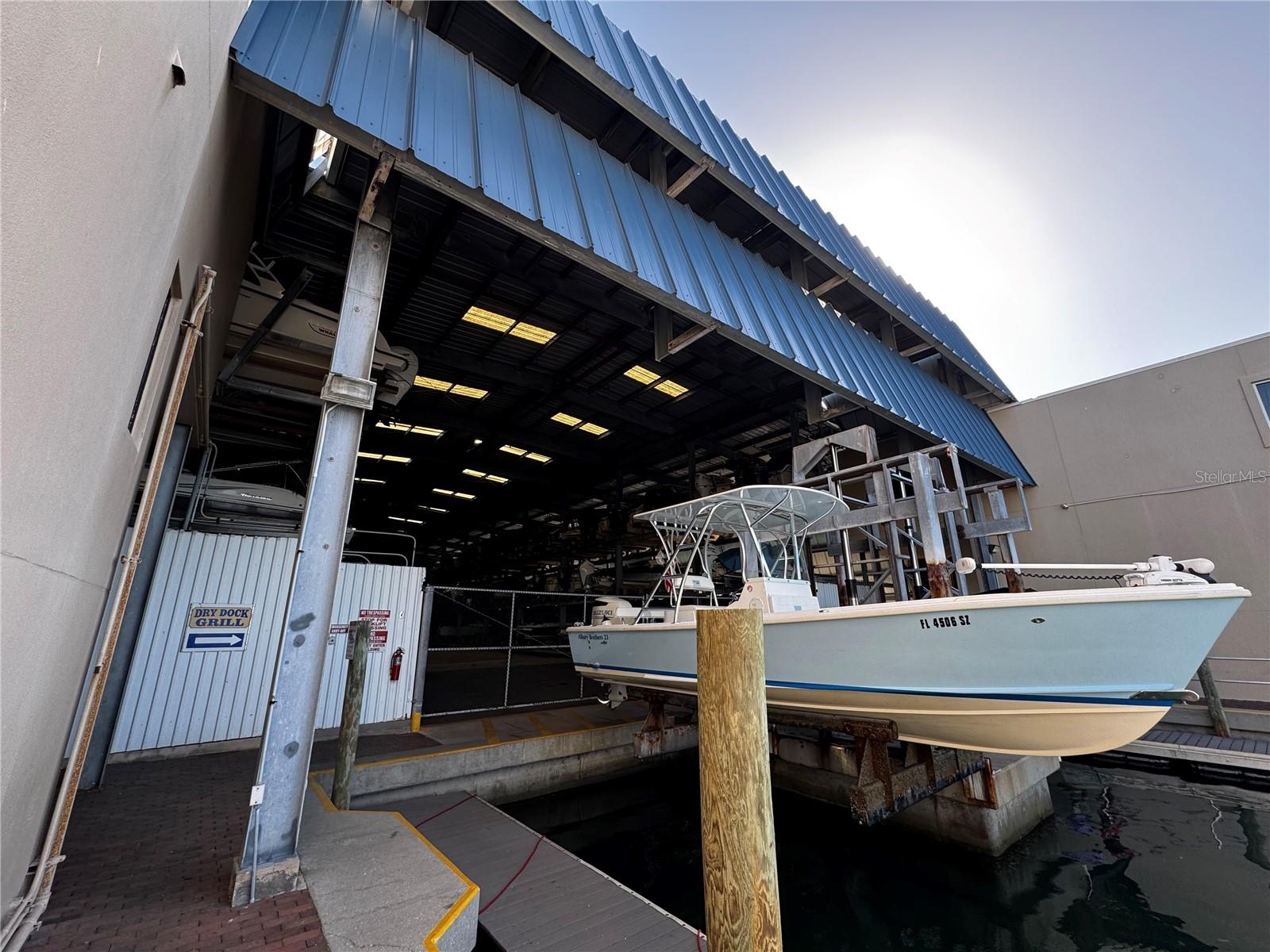 Welcome to Slip #2112 at The Boathouse on Longboat, a rare opportunity on the coveted south end of Longboat Key! This is your chance to secure a covered, hurricane-protected slip in one of Sarasota's most desirable waterfront communities. This slip accommodates boats up to 23'6''Lx8'6''Wx7'2''H (No T-tops unless collapsible). Enjoy first-class service at an affordable monthly rate with unbeatable amenities. Located just minutes from both Sarasota Bay and the Gulf, this facility offers on-site fuel, restrooms, a ship store, maintenance services, leasing assistance, and even the popular Dry Dock Waterfront Grill restaurant on site. Simply call ahead and your boat will be launched, fueled, and waiting for you. At the end of the day, return to dock and watch as the team expertly rinses and stores your boat in its covered slip. This is more than boat storage, it's effortless boating in paradise. Don't miss your chance to own high and dry covered storage on Longboat Key!
