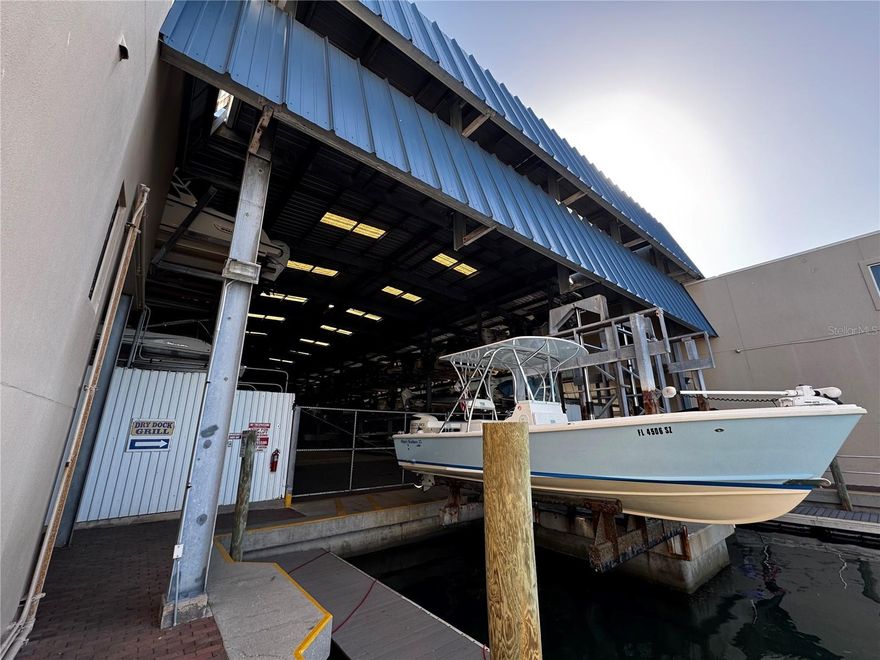 Welcome to Slip #2112 at The Boathouse on Longboat, a rare opportunity on the coveted south end of Longboat Key! This is your chance to secure a covered, hurricane-protected slip in one of Sarasota's most desirable waterfront communities. This slip accommodates boats up to 23'6''Lx8'6''Wx7'2''H (No T-tops unless collapsible). Enjoy first-class service at an affordable monthly rate with unbeatable amenities. Located just minutes from both Sarasota Bay and the Gulf, this facility offers on-site fuel, restrooms, a ship store, maintenance services, leasing assistance, and even the popular Dry Dock Waterfront Grill restaurant on site. Simply call ahead and your boat will be launched, fueled, and waiting for you. At the end of the day, return to dock and watch as the team expertly rinses and stores your boat in its covered slip. This is more than boat storage, it's effortless boating in paradise. Don't miss your chance to own high and dry covered storage on Longboat Key!