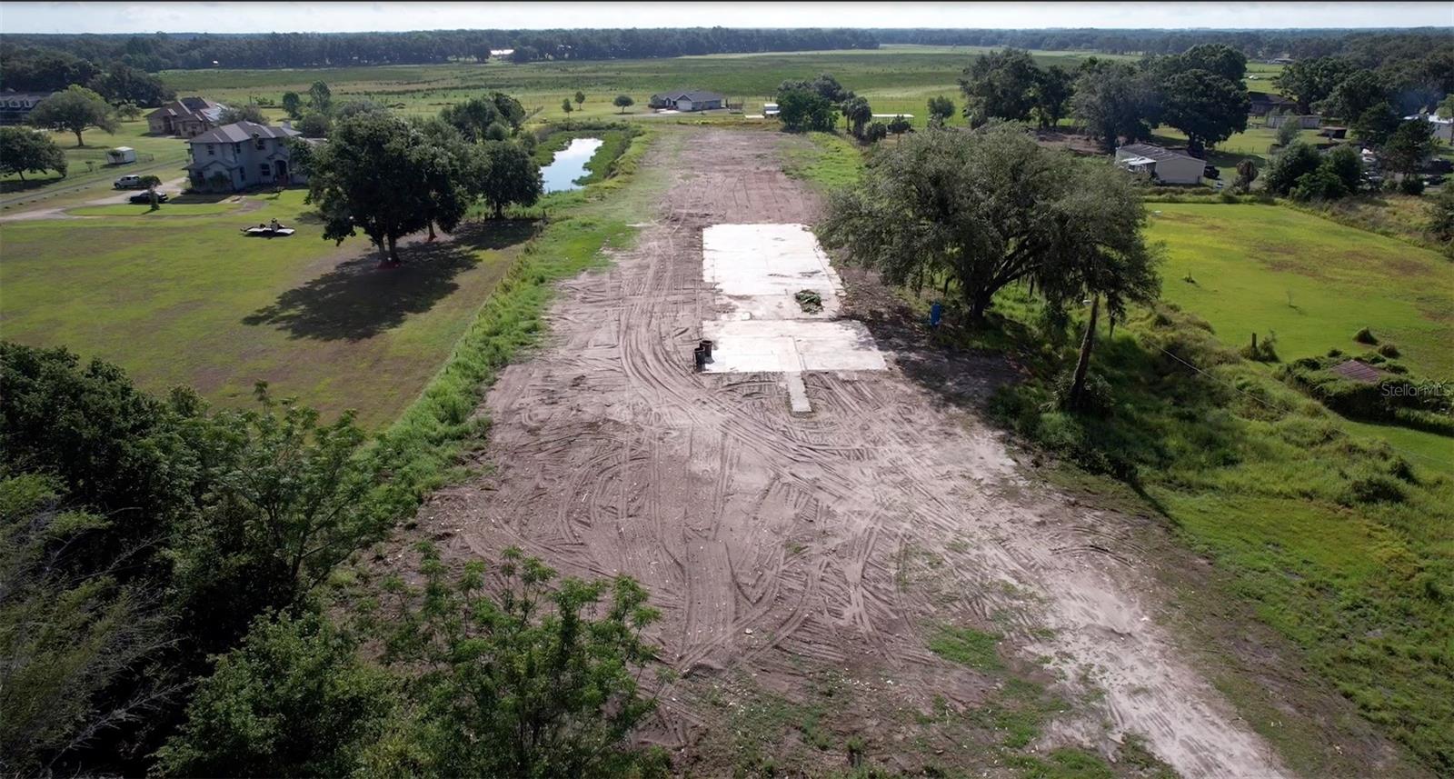 BEAUTIFUL 4.92 ACRES LOCATED IN THE CORK AREA. PROPERTY HAS BEEN COMPLETELY CLEARED EXCEPT CONCRETE SLAB & WELL
20'X100' POND