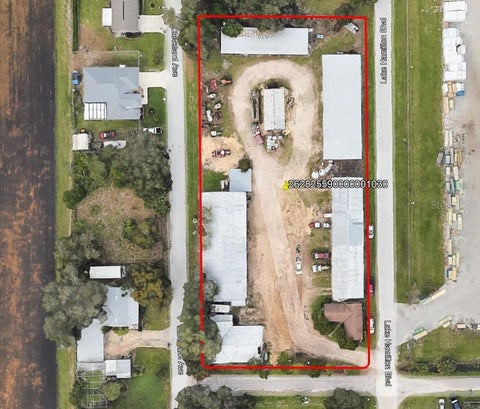 Photo of 205 Lake Hamilton Boulevard, Winter Haven, FL 33881 (MLS # L4965750)