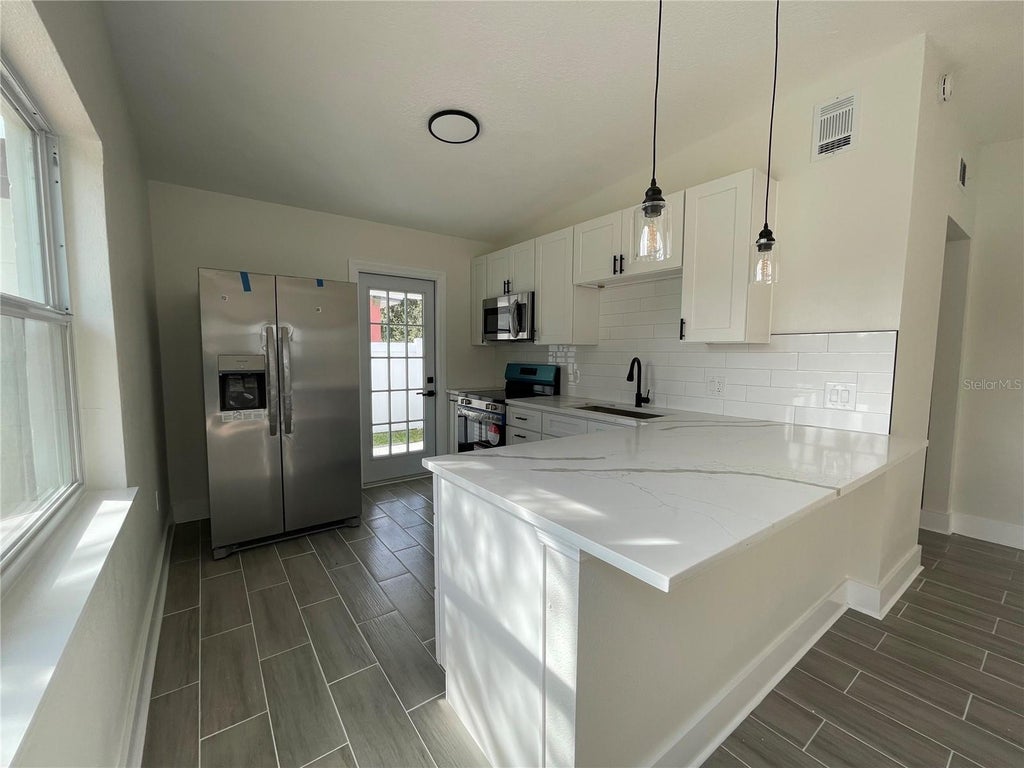 Photo of 4045 Shellman Street, Orlando, FL 32811 (MLS # S5157725)
