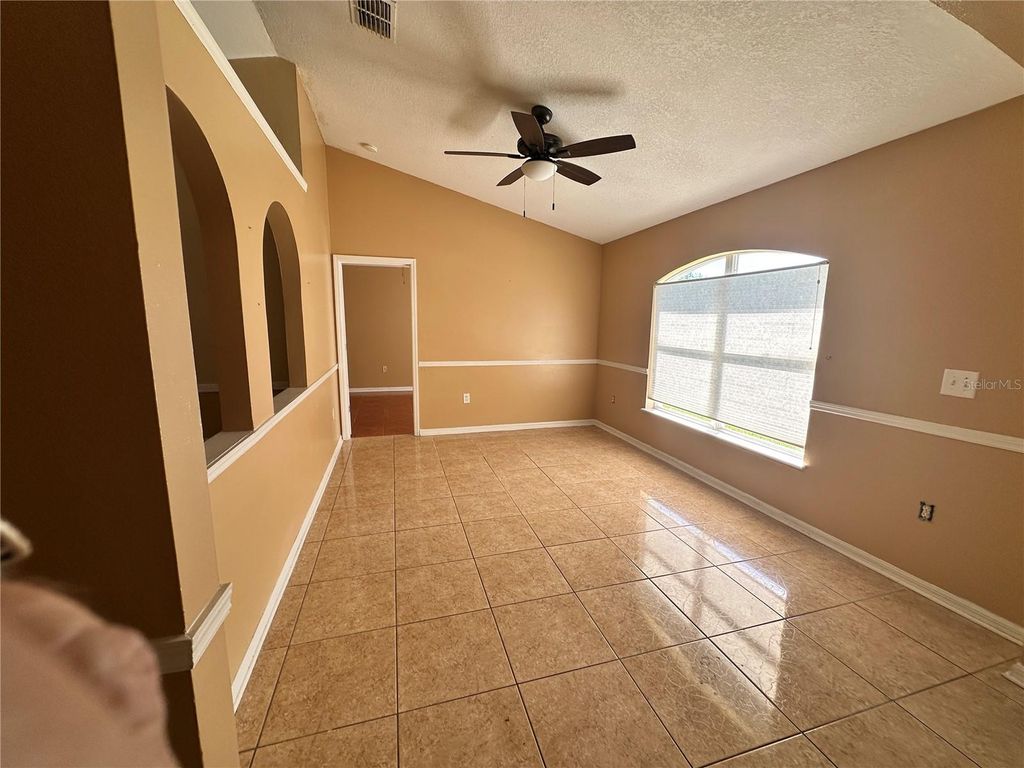 Photo of 633 Basingstoke Court, Kissimmee, FL 34758 (MLS # O6347060)