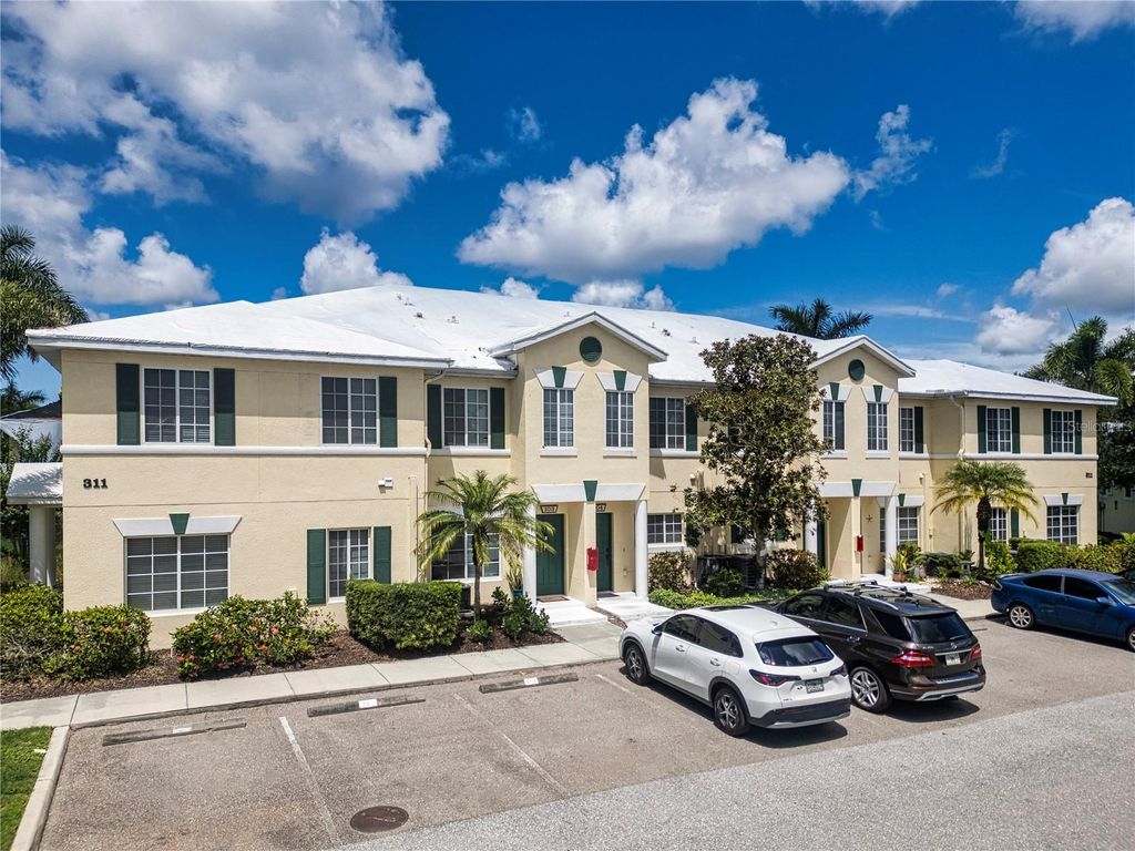 Photo of 311 Cape Harbour Loop #103, Bradenton, FL 34212 (MLS # A4663665)