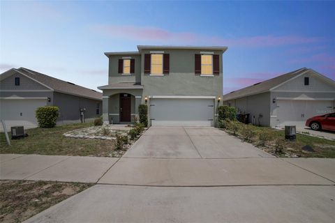 Photo of 129 Eagleview Loop, Davenport, FL 33837 (MLS # O6315568) Photo of 129 Eagleview Loop, Davenport, FL 33837 (MLS # O6315568)