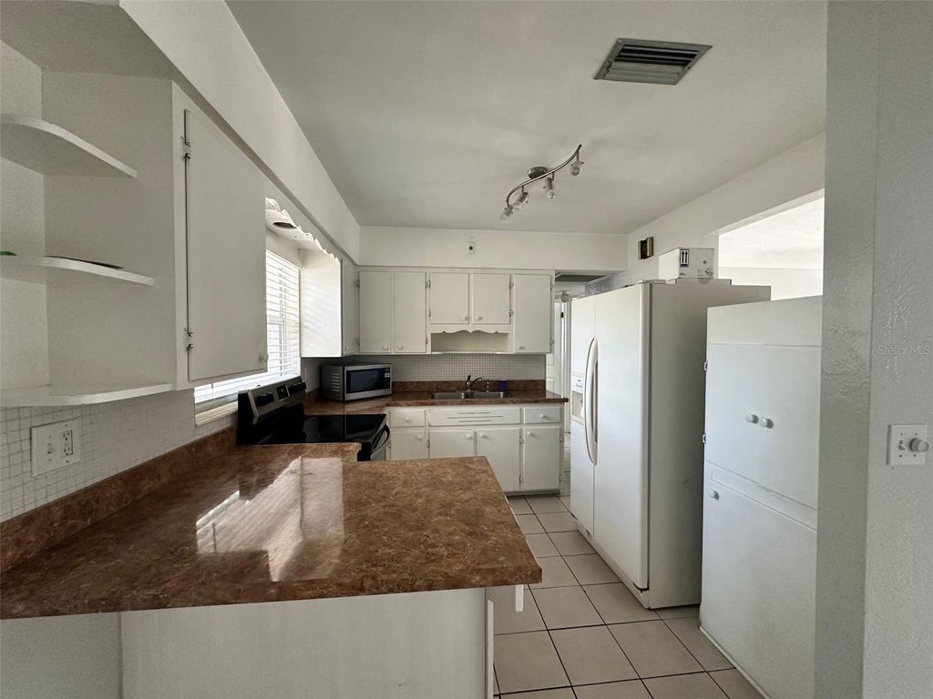 Photo of 3599 66th Way N, St Petersburg, FL 33710 (MLS # TB8374593)