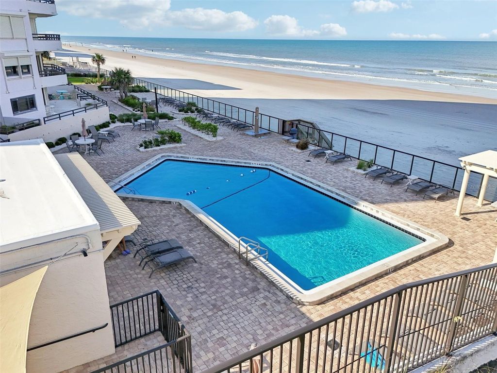 Photo of 3855 S Atlantic Avenue #505, Daytona Beach, FL 32118 (MLS # O6398811)