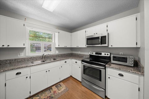 Tiny photo for 8715 SW 97th Street #E, Ocala, FL 34481 (MLS # OM727221)