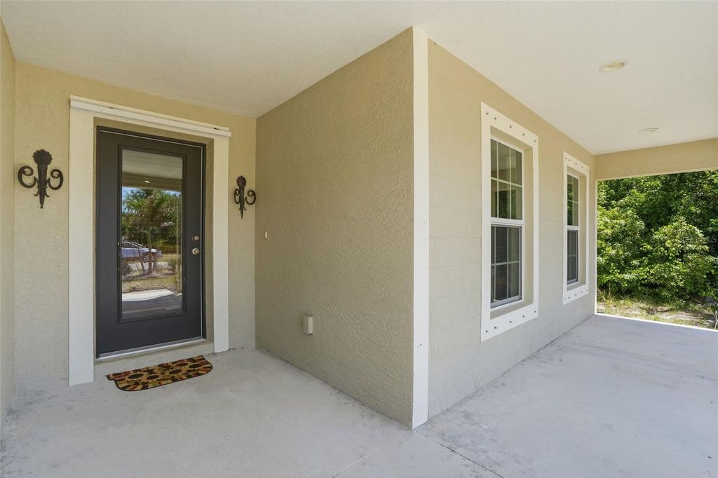 Photo of 126 Green Pine Park, Rotonda West, FL 33947 (MLS # C7525469)