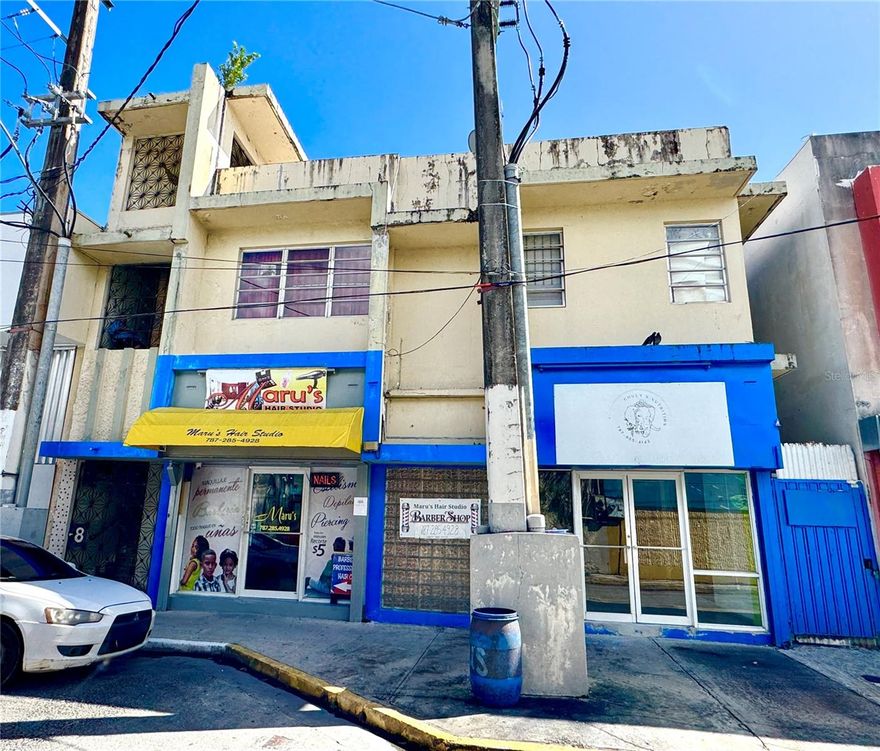 Excellent residential/commercial investment property at the best price on Dr. Vidal Street in Humacao. Only $149,000. It consists of 3 units. The first level has 2 commercial spaces; one is currently rented with 1,400 sq ft and 2 bathrooms. The second commercial space is 720 sq ft in an open-plan layout with 2 half bathrooms. The second level is a residential property with 3 bedrooms, 1 bathroom, living room, kitchen, and dining room (currently rented). It includes a security sliding door, stained glass, and glass doors on the entrance.