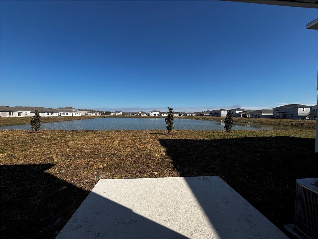 Photo of 4763 Guinep Lane, Kissimmee, FL 34758 (MLS # O6413069)