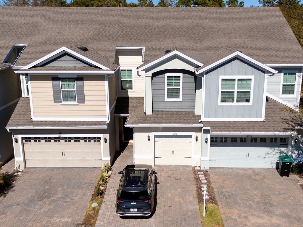 Photo of 6989 Tussilago Way, Orlando, FL 32822 (MLS # S5143436)