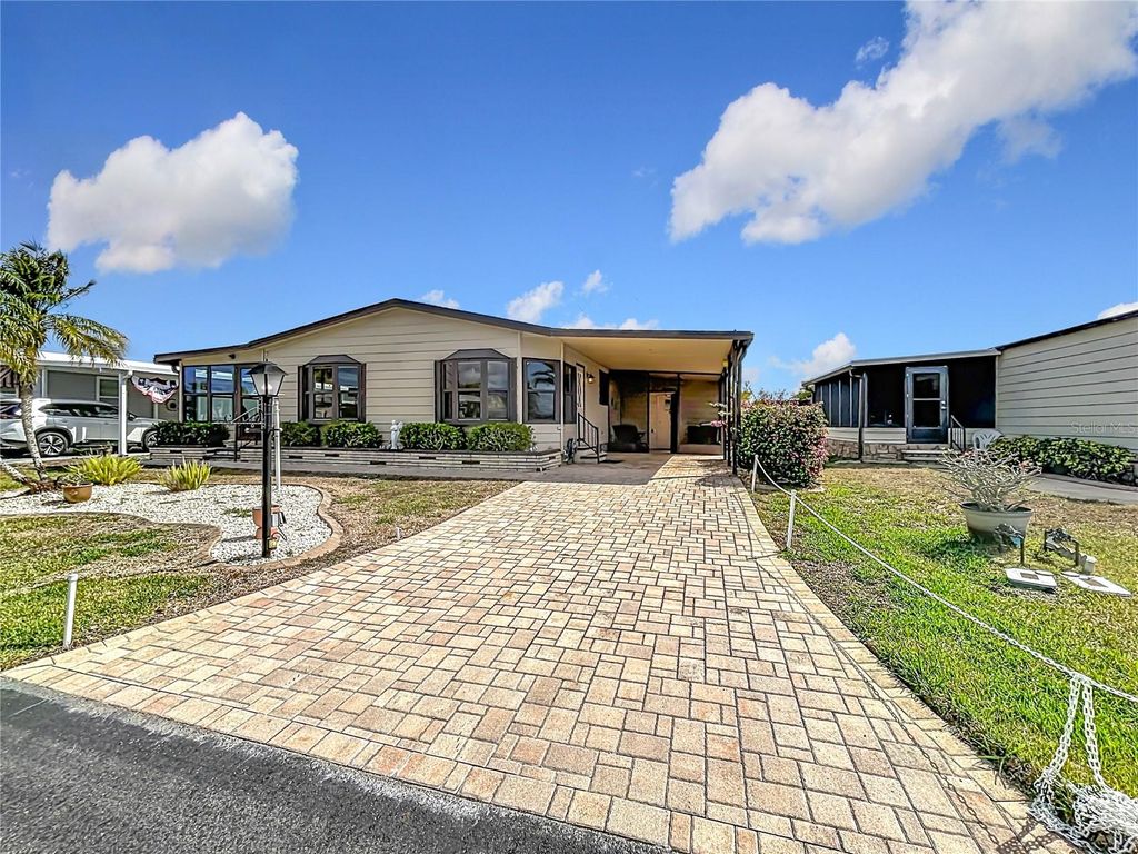 Photo of 556 Madero, North Port, FL 34287 (MLS # C7522443)