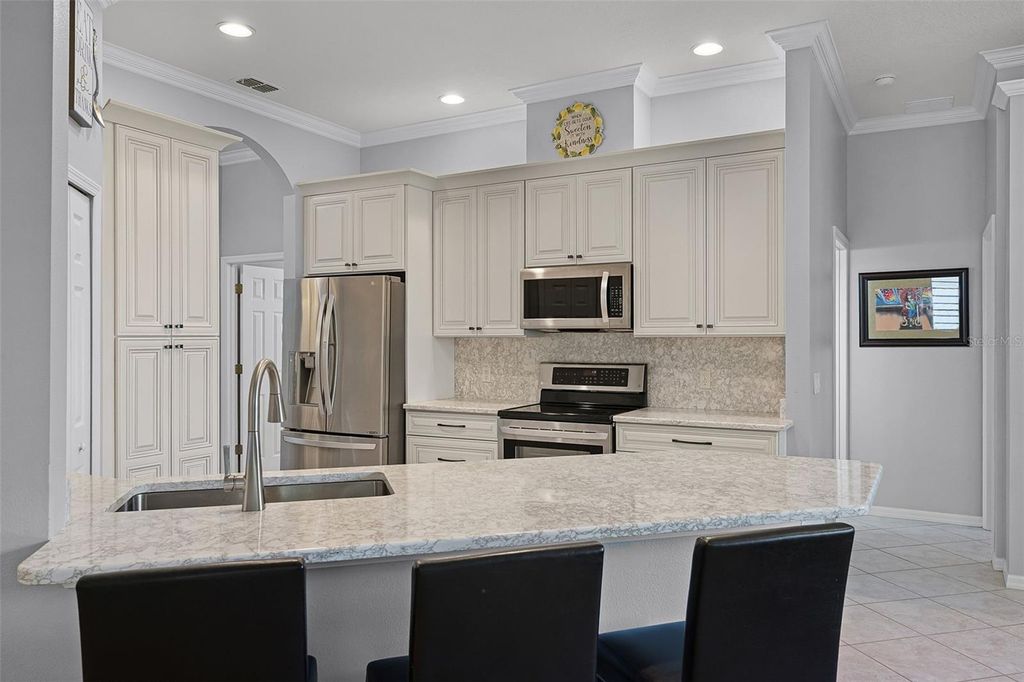 Photo of 1124 Hidden Bluff, Clermont, FL 34711 (MLS # O6378849)