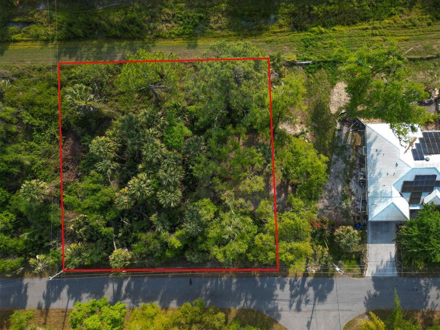 Vacant land with privacy in one of Florida’s fastest-growing counties- Sarasota County. Located on a SPACIOUS GREENBELT in North Port, this property sits in a quiet neighborhood with easy access to I-75, making travel to Sarasota, Venice, and Port Charlotte or even Naples a breeze. Just a short drive away is Wellen Park, a vibrant and expanding community filled with shops, restaurants, parks, walking trails, live entertainment, and the Atlanta Braves Spring Training stadium. North Port is seeing significant growth, with new homes, schools, and businesses being built throughout the area, making it a great area for buying land. With no HOA and a quiet setting near beaches, golf courses, and nature preserves, this is a fantastic location for your future home or investment project. Plus, you can meet with our custom home builder to answer all your new build questions!