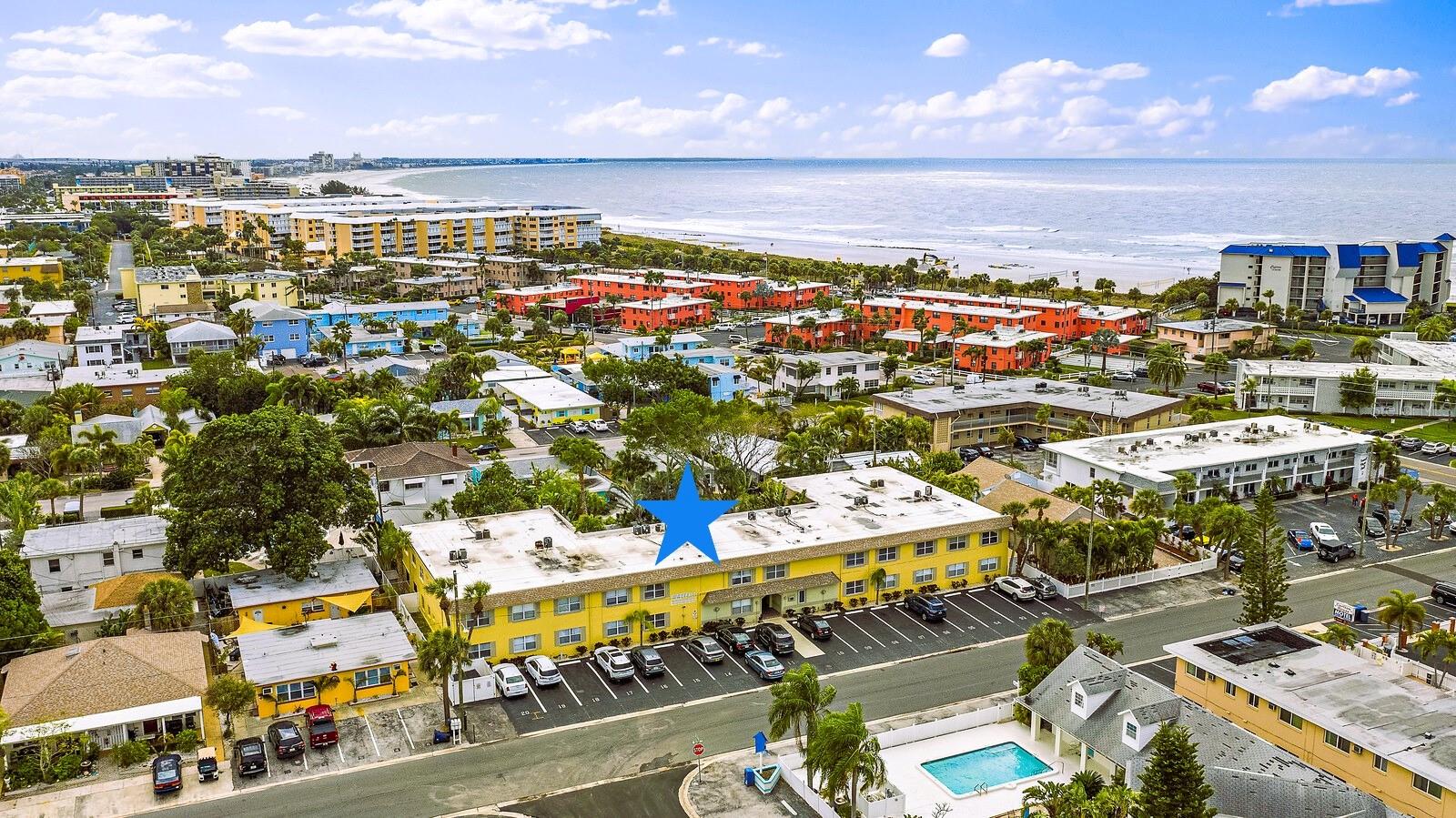Ideally located just steps from the sugary white sands of the Gulf of Mexico, this pristine condo is the perfect vacation getaway or rental property! Incredible investment opportunity with very little rental restrictions- rent for as little as 3 nights! Located on the 2nd floor, this condo overlooks the tropical courtyard, BBQ area and sparkling pool! Light and bright inside with cool tile floors and attractive furnishings. Sold turnkey- just bring your beach bags and start enjoying the beach life of St. Pete Beach! Nice open floor plan with lots of closet space- including several owner’s closets. Unlike many beach condos, this condo has its own full-size washer & dryer! The master suite is spacious and has a lovely, updated bathroom. Lots of upgrades including hurricane windows, 2023 HVAC, 2018 water heater, smart thermostat, separate water shut off from the building, new mattress, and parking space #16- where you can park two cars in tandem. The Waves is a tropical 19-unit condo complex tucked away on northern St. Pete Beach. Wonderful amenities include a heated swimming pool, BBQ grills, and laundry room. Low condo fees include water, sewer, garbage, sewer, cable TV, high speed internet and more! No damage from any hurricanes and the building boasts a 2024 new roof. Super convenient to restaurants, beach bars, cafes, grocery stores and more! Embrace the beach life and call this home!