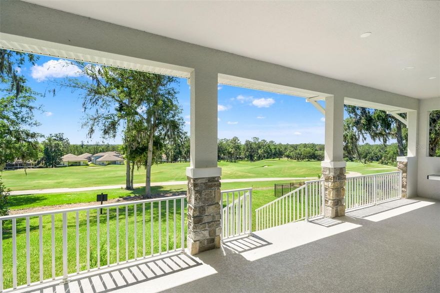 PREMIUM GOLF COURSE VIEW!! Recently built and Owner added significant improvements after purchasing, this exceptional residence is a true example of newer construction reimagined with elevated finishes—perfectly positioned on a premium golf course homesite with sweeping, elevated views of the 15th fairway in Southern Hills.
Brick pavers and charming front porch set the tone, while inside, luxury vinyl plank flooring and plantation shutters carry throughout the home. Offering 3 bedrooms plus a spacious office (easily convertible to a 4th bedroom), 3 full baths, and a 3-car garage with a desirable split configuration, the layout is both functional and refined.
The kitchen is a standout, featuring white shaker-style wood cabinetry, quartz countertops, a large center island with sink and breakfast bar, under-cabinet lighting, and a full suite of stainless appliances including a 5-burner gas cooktop, built-in microwave and oven, and stainless range hood. A huge walk-in pantry with wood shelving provides exceptional storage. Thoughtful additions like a dedicated beverage station—complete with beverage fridge for everything from morning coffee to evening cocktails—and a built-in home organization center with stand-up desk, cabinetry, and charging station truly set this home apart.
The expansive great room is designed for both comfort and entertaining, showcasing a tray ceiling, powered drop-down shades, and panoramic golf course views, with two sets of sliding glass doors opening to a wide, covered lanai.
The primary suite is a private retreat with tray ceiling, prewiring for wall sconces, dual walk-in closets with wood shelving, and a spa-inspired en suite bath featuring dual vanities, a freestanding soaking tub, oversized walk-in shower, and linen closet. Bedrooms two and three share a Jack-and-Jill bath with double sinks and a tub/shower combination. The office, accessed through double glass French doors, features coffered ceilings and ample space to add a closet if a fourth bedroom is desired.
Even the laundry room has been thoughtfully designed to be both stylish and functional.
Outdoor living is equally impressive, with a large covered lanai offering expansive fairway views and pre-plumbed and wired for a future outdoor kitchen with gas, water, and electric already in place.
Additional upgrades include elevated outlets and CAT5 wiring for wall-mounted TVs, gutters and French drains, 30-amp service prewire, filtered reclaimed irrigation, and gas and electric connections at the rear of the home for a future pool &/or fire pit.
All of this is located within Southern Hills, a premier resort-style, golf cart-friendly community centered around an 18-hole, par-72 Pete Dye-designed championship golf course, ranked by Golfweek as a top residential course in the country! Residents enjoy a clubhouse with fine dining, tiki bar, luxury pool and spa, fitness center, pickleball and clay tennis courts, scenic walking trails, and parks.
This exceptional home offers the best of new construction—without the wait—enhanced, upgraded, and truly move-in ready in one of Brooksville’s most sought-after communities.