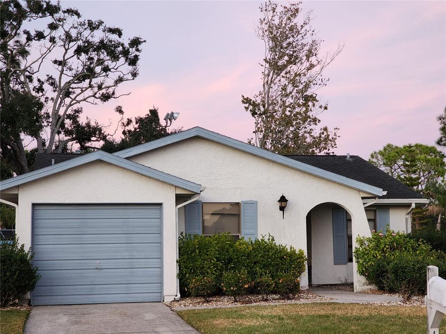 This 3 bedroom 2 full bath home boasts of a vaulted ceiling in the living room area, inside laundry and en suite bath attached to your primary bedroom. The second full bath is located between your other 2 bedrooms with access from the living area. Equipped with built in stove and dishwasher; the refrigerator also conveys to the new owner with the property. Nearby community pool and hot tub and also community  playground.  The home is nestled into a beautiful neighborhood just off Tampa Road with easy access to the Beaches, Airports, Tampa, Safety Harbor, Parks and Recreation and so much more.