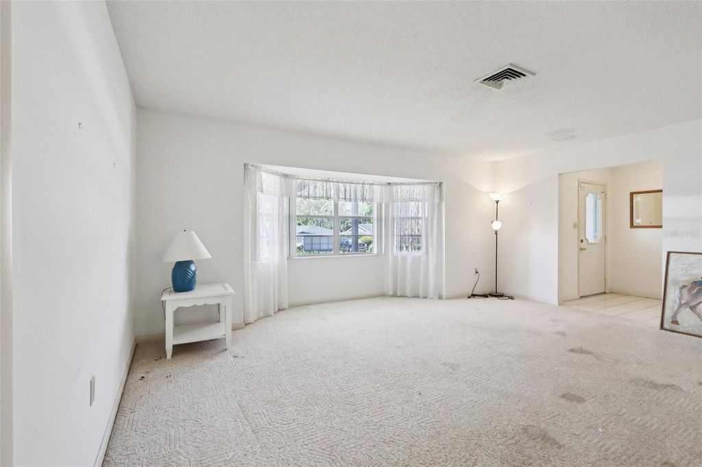 Photo of 12 Sun Air Boulevard E, Haines City, FL 33844 (MLS # TB8492893)