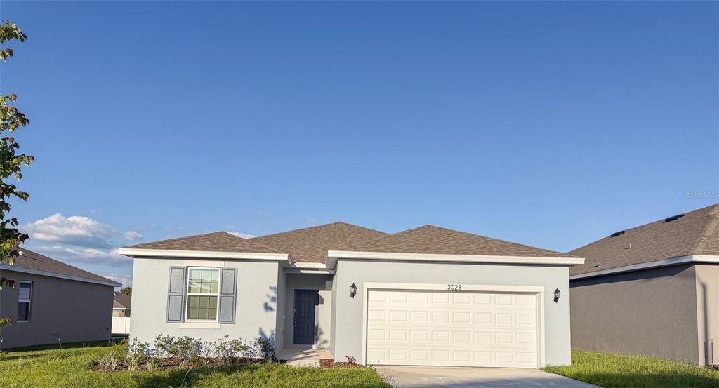Photo of 2023 Firethorn Loop, Haines City, FL 33844 (MLS # O6403879)