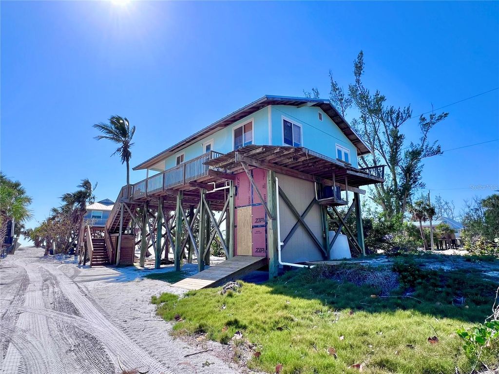 Photo of 8472 Grand Avenue, Placida, FL 33946 (MLS # D6141923)