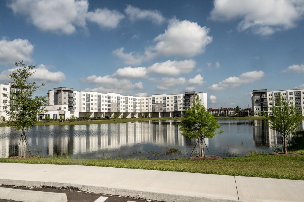 Photo of 5579 Millenia Park Blvd #105, Orlando, FL 32839 (MLS # O6406266)
