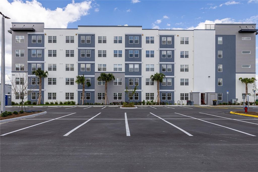 Photo of 5579 Millenia Park Blvd #105, Orlando, FL 32839 (MLS # O6406266)