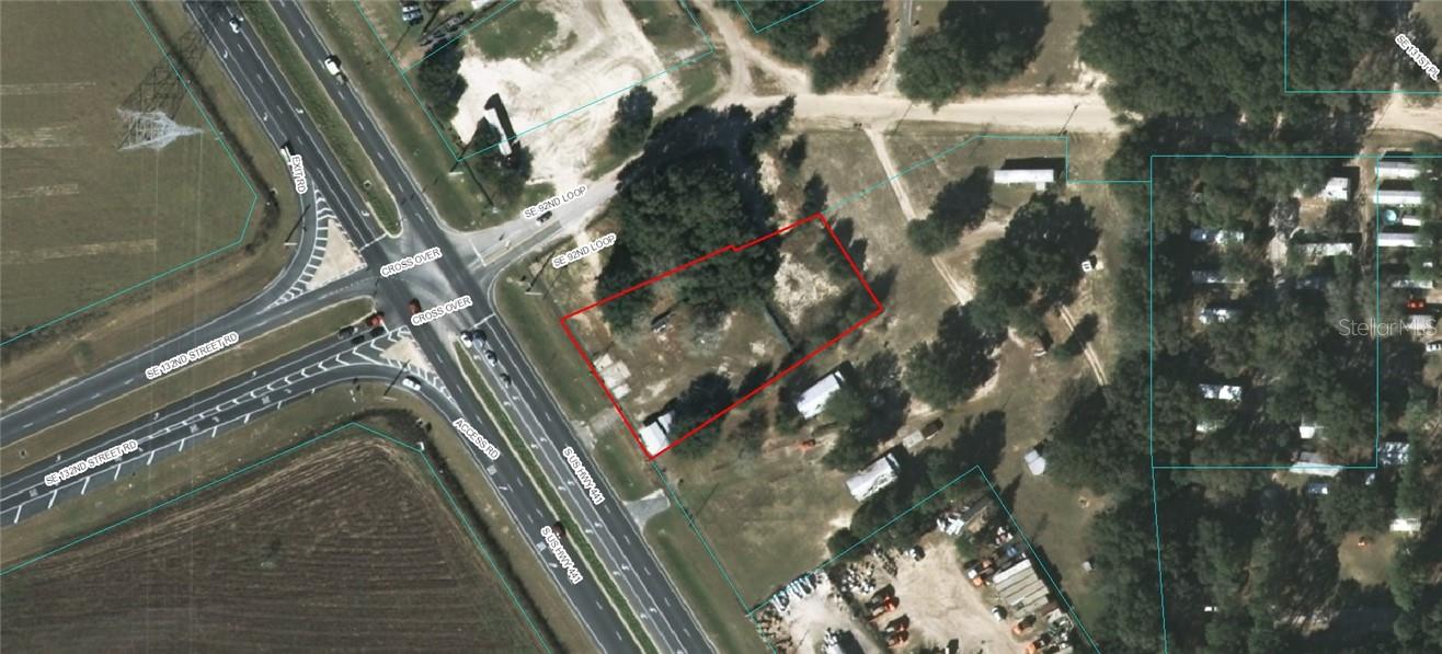 Desirable B-4 zoned, mixed use development opportunity. Place your retail shop, office or other business on this parcel offering high visibility and easy access to Hwy 441. Located only minutes from Ocala and The Villages with many residential and business communities nearby.