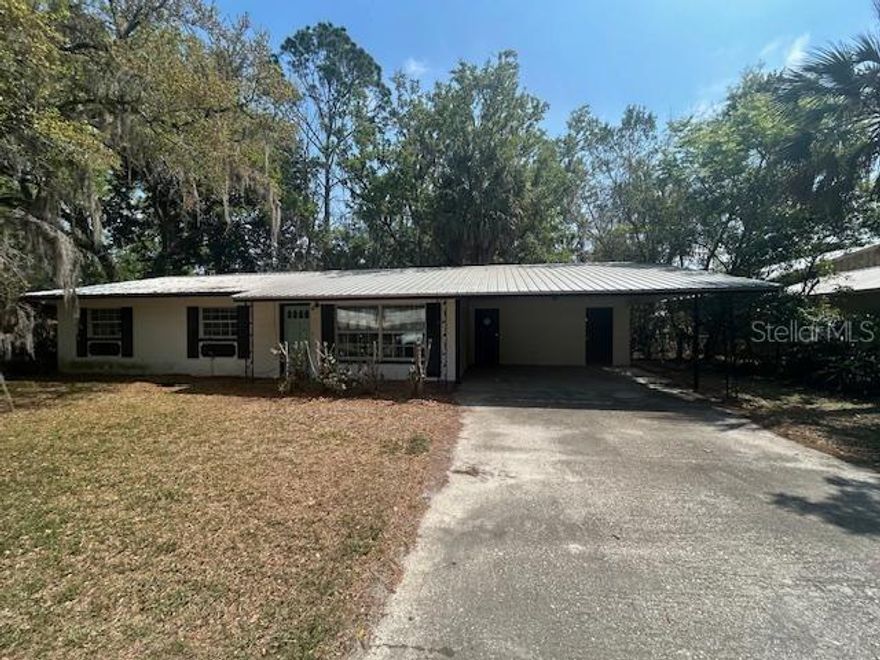 Located within walking distance of the heart of downtown Chiefland, schools and businesses this cute 3 bedroom 2 bath home concrete block construction with a metal roof is waiting to be all yours.