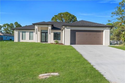 Photo of 2806 Vera Avenue S, Lehigh Acres, FL 33976 (MLS # A4688700)