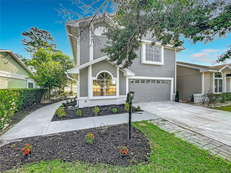 Beautifully updated, move-in ready home in Winter Park. A brand new A/C system is scheduled to be installed. This 4-bedroom, 2.5-bath home with a 2-car garage features waterproof luxury vinyl flooring, fresh interior finishes, new recessed lighting, and updated ceiling fans, all combined with a bright and functional layout.

As you enter, you are welcomed by a custom wood decorative accent wall that adds warmth and character. Just behind the wall, a renovated half bathroom is conveniently located on the first floor.

The kitchen is one of the main features of the home, fully renovated with custom green cabinetry, quartz countertops, a farmhouse sink with a modern faucet, gold hardware, and a clean contemporary backsplash. The space includes abundant cabinetry plus a pantry for additional storage and comes equipped with new stainless steel appliances including refrigerator, range, and range hood. Pendant lighting and chandelier details add a designer touch.

The living area includes a fireplace and sliding doors that open to a screened patio, creating a comfortable indoor-outdoor flow. The outdoor space provides a private setting with a low-maintenance yard and room to relax or personalize.

Upstairs, you will find all bedrooms along with a conveniently located laundry area. The primary suite is oversized and designed as a true retreat, featuring dual pendant lighting and great natural light. The primary bathroom is fully renovated with a freestanding soaking tub, double vanity, glass-enclosed walk-in shower with rainfall shower head, and modern finishes. The suite also includes dual closets for added functionality.

Secondary bedrooms are well-sized and provide flexibility for family, guests, office, or additional living space.

Additional improvements include a new front door, updated lighting throughout, and thoughtful design details that make this home feel clean, cohesive, and move-in ready.

Located in the Villas of Casselberry community, this property has a low HOA with access to a community pool and sidewalks. Conveniently situated near major roads, shopping, dining, Full Sail University, Rollins College, UCF, and just minutes from Downtown Orlando.

Move-in ready with extensive updates and a functional layout, this is a strong opportunity in the Winter Park market.