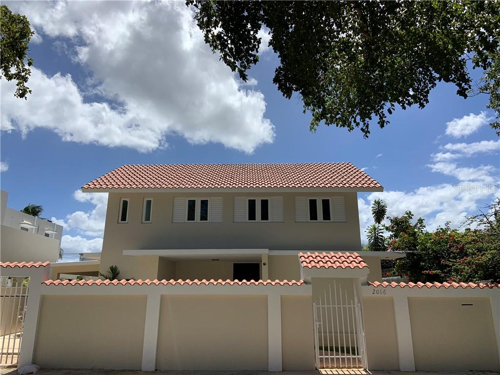 Enjoy life at its best in San Juan's most exclusive gated beach community. This custom newly remodeled property is only 2 short blocks away from one of the island's best beaches in a very centrally located area. The home features an open living dining area next to an ample eat in kitchen with NEFF kitchen cabinets and state of the art Subzero and Wolf appliances, a separate pantry laundry, and a nice covered terrace with an outdoor bar for BBQ. The home also boasts 4 bedrooms, an office (or 5th bedroom), 4.5 baths, a large family area in the second story with an additional space to make another office, or an additional 6th bedroom. The home has many luxurious details such as natural stone and marble floors, onyx tiles in the bathrooms, among others. There is a large carport for 3 cars.