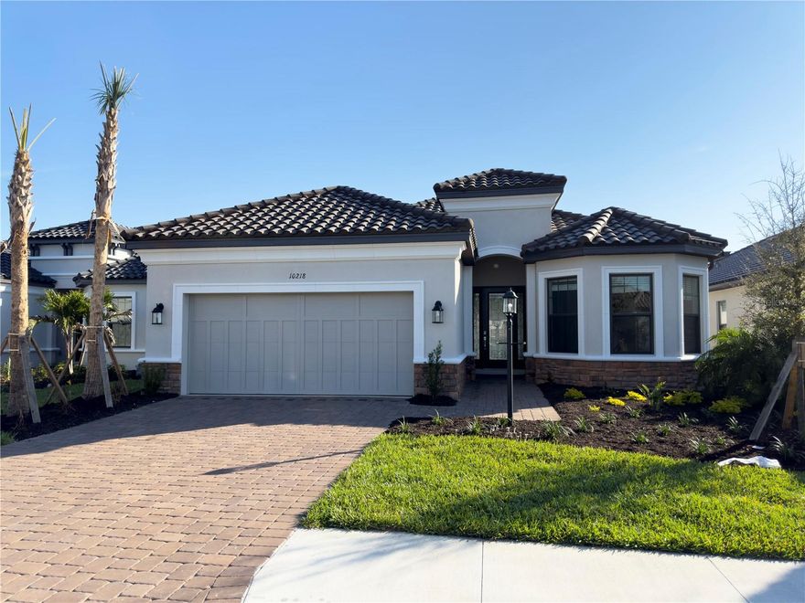 Available November 8, 2025 | Unfurnished. Experience refined Florida living in this elegant 3-bedroom, 3-bath residence with a private den and attached 2-car garage. Thoughtfully designed and beautifully appointed, this home offers an effortless blend of sophistication, comfort, and functionality.

Every detail reflects quality craftsmanship—from the gourmet kitchen featuring quartz countertops, double ovens, and premium cabinetry to the tray ceilings accented with crown molding. The open-concept layout flows seamlessly from the main living spaces onto a spacious screened lanai, where a private heated saltwater pool and spa await. The lanai’s tranquil water views and child-safe enclosure create a serene and secure outdoor retreat, ideal for entertaining or unwinding in peace.

Elegant tile flooring graces the main living areas, while engineered wood adds warmth to the bedrooms. The home’s soft, neutral color palette and tasteful finishes provide a timeless backdrop suited to a variety of décor styles. A second bedroom with an ensuite bath enhances privacy and versatility for guests or family.

With its luxurious upgrades, thoughtful layout, and captivating water vistas, this home offers the perfect balance of style and relaxation—crafted for those who appreciate quality and understated elegance. Zoned for Skye Ranch Schools and Riverview High School.