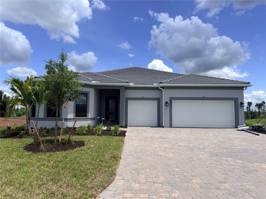 Under Construction. The Renown is designed for homeowners who love open, elevated living without sacrificing warmth or functionality. A balance of luxury and livability with a massive kitchen island that anchors the space beautifully, while features like dual walk-in closets in the owner's suite, a spacious covered lanai with custom pool and 3-car garage make the home intentionally designed. Enjoy upgrades including built-in kitchen appliances, zero-corner sliding glass doors, 8' interior doors, super shower and porcelain tile throughout the home.