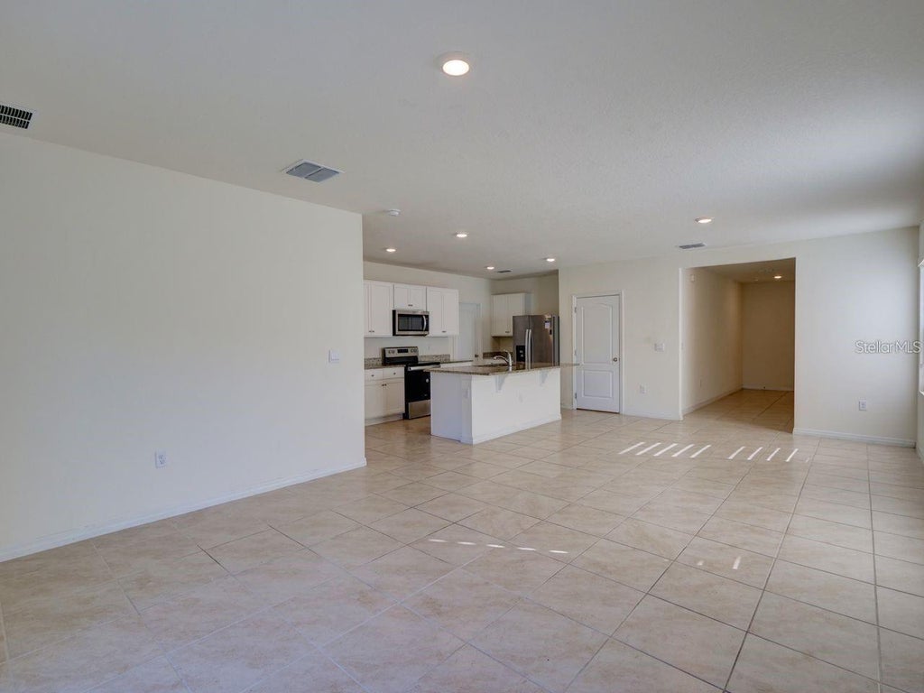 Photo of 2501 Ribbon Fall Avenue, Davenport, FL 33837 (MLS # O6445758)