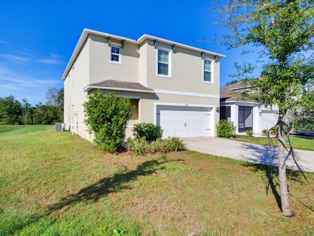 Photo of 2501 Ribbon Fall Avenue, Davenport, FL 33837 (MLS # O6445758)