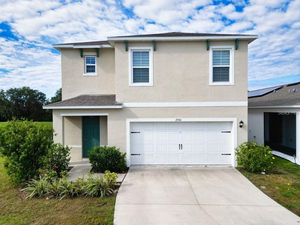 Photo of 2501 Ribbon Fall Avenue, Davenport, FL 33837 (MLS # O6445758)