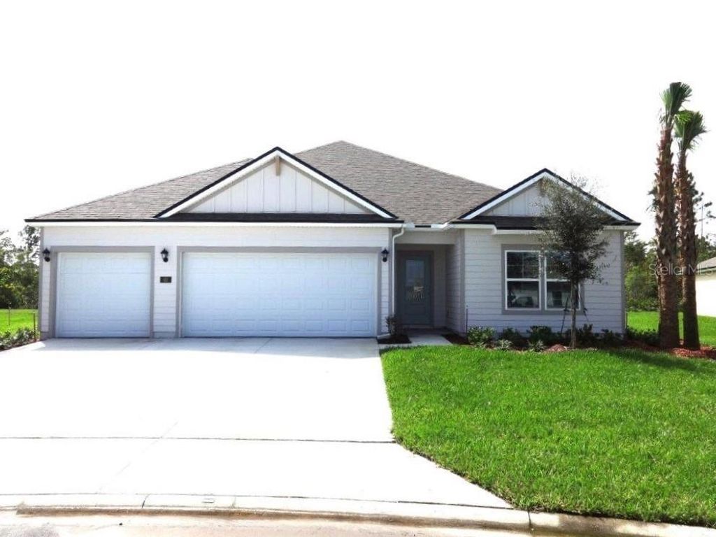 Photo of 62 Lumber Jack Trail, Palm Coast, FL 32137 (MLS # FC291449)