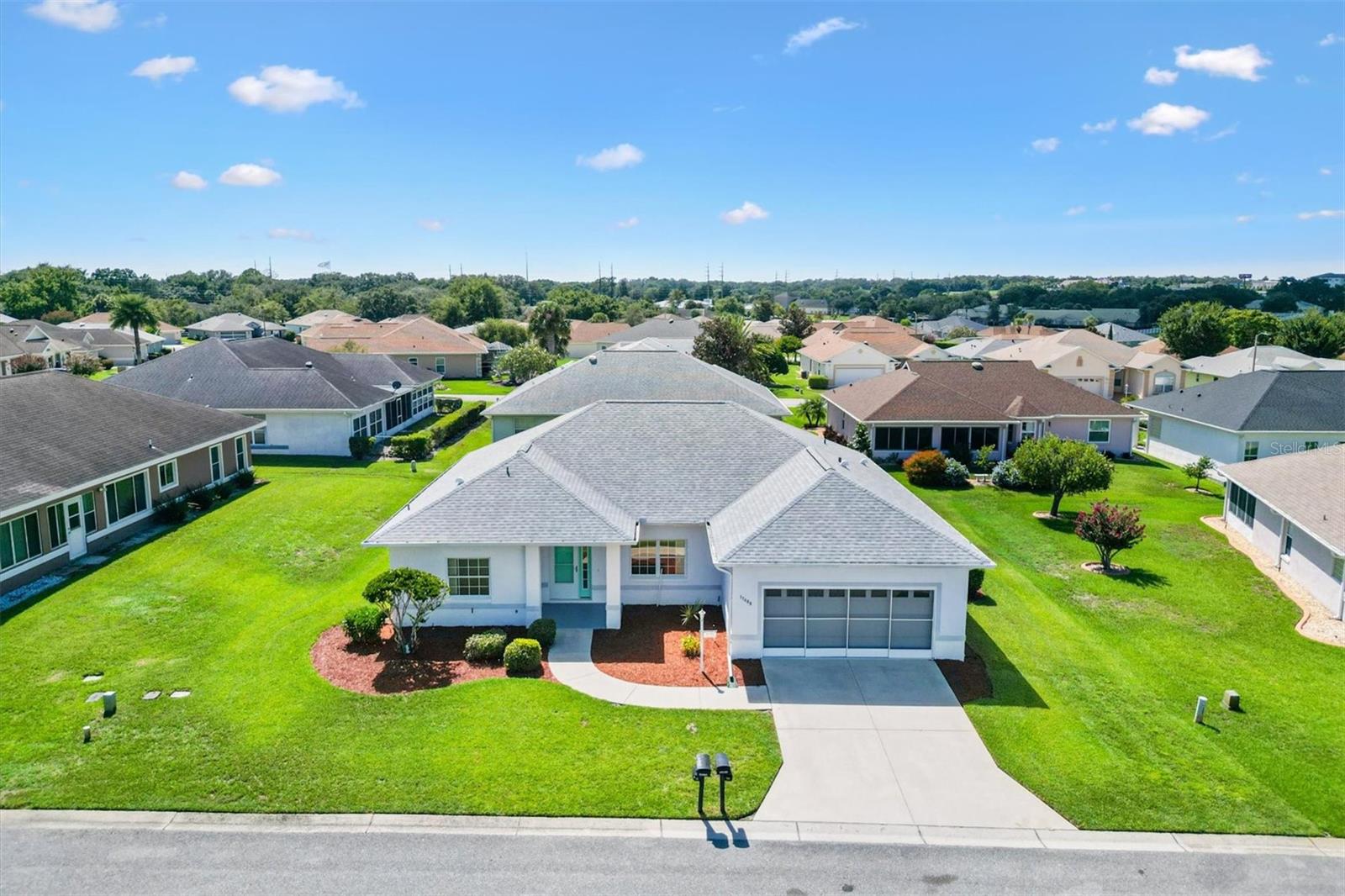 One or more photo(s) has been virtually staged. Located in the Exclusive 55+ Golf Community of STONECREST, this home is bursting with potential and ready for you to put your personal stamp on it! With recent updates already in place, NEW ROOF (2021), NEW HVAC system (2018), and NEW ACRYLIC WINDOWS on the lanai (2022), you can focus on the fun part: making it your own! The Captiva split floor plan offers 3 Bedrooms, 2 Baths, High ceilings, and a spacious layout built with durable CONCRETE/BLOCK/STUCCO with STEEL STUDS. Imagine taking this solid foundation and transforming it with your own style, whether that means creating a modern retreat, or an entertainer’s dream. The lanai and backyard provide even more space to design the Florida lifestyle you’ve been dreaming of. All this home needs is your vision and a little TLC to unlock its full charm. With shopping, dining, and medical facilities just minutes away by golf cart, you’ll not only be customizing a house, you’ll be stepping into a lifestyle. Don’t miss the chance to turn this blank canvas into your perfect retirement haven!