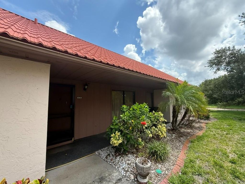 Photo of 6564 Draw Lane #102, Sarasota, FL 34238 (MLS # A4695561)