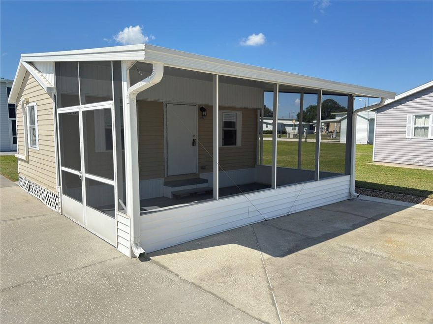 Few opportunities like this surface in one of Central Florida's most established Class A motorhome communities. This generously sized concrete pad is engineered to handle any Class A motorhome, with room to simultaneously host up to two additional guest rigs — all serviced by 200-amp electrical and full RV utility hookups on both sides of the pad.
The climate-controlled casita shed goes well beyond storage. Thoughtfully outfitted for day-to-day living, it includes a comfortable sitting area, mini refrigerator, television, ceiling fan, and a dedicated computer workspace. The full bathroom is equally well-appointed, with a washer and dryer, shower, toilet, sink, water heater, and exhaust fan. Step outside and the attached screened-in covered porch extends your living space even further — a natural spot for morning coffee, evening conversations, or simply enjoying the Florida air without the bugs. Whether you need a guest suite, a quiet home office, a hobby space, or simply a place to decompress — this casita delivers.
The lot's oversized footprint leaves meaningful space for future improvements, including the addition of a manufactured home or an RV port — giving you the flexibility to evolve the property as your lifestyle and priorities shift over time. The annual HOA fee covers basic lawn care and common area upkeep, so the community stays sharp year-round without the burden falling entirely on individual owners.
Sitting just 3.5 miles from I-4, Mount Olive Shores punches well above its weight on convenience. Tampa International, Orlando International, world-class medical centers, major retail corridors, and Central Florida's top attractions are all within roughly an hour's drive.
The newly built 5,000-square-foot Community Center raises the bar for what RV community living can look like — featuring a full commercial kitchen, regulation pool and shuffleboard tables, dart boards, arcade games, a card room, library, vending area, and a covered BBQ lanai. A packed social calendar — bingo nights, karaoke, potluck dinners, holiday events, and more — means the community is genuinely alive, not just well-manicured.
Mount Olive Shores is a deed-restricted community. Ownership or lease of a Class A motorhome is required during your first year of residency — a standard that protects the character and long-term value of the neighborhood. This is premium RV real estate in a community that has stood the test of time. Opportunities at this level don't wait.