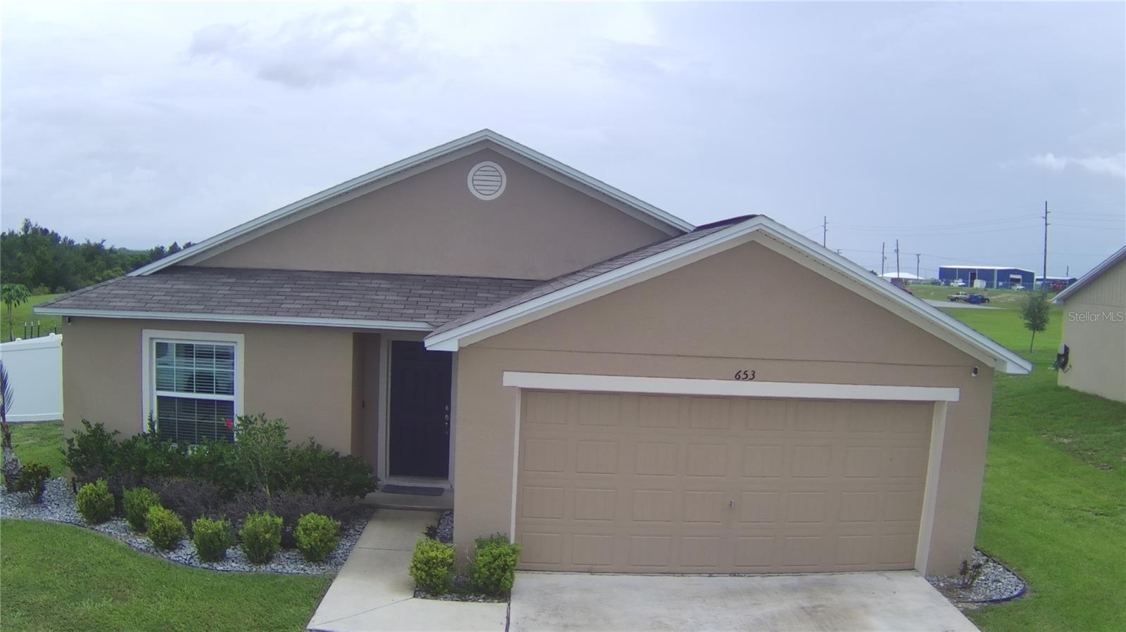Under contract-accepting backup offers. Welcome to this beautiful and well-maintained home! This 3-bedroom, 2-bathroom home boasts 1,266 sqft of living space and an oversized lot with a fence and gates for easy access to the backyard .Septic tank was emptied and a treatment was applied on July 2023. The seller has purchased a year treatment for the septic tank and will stay in the house for the buyer to continue the septic tank maintenance the rest of the year. Located in Haines City/Lake Hamilton, this home is conveniently close to US Highway 27, Chain of Lakes, restaurants, Interstate 4, SR1792, shopping, Cypress Lanes (bowling), Legoland, and many more attractions. Don’t miss out on the opportunity to own this amazing home! All measurements are from public records. Buyers and buyer’s agents are responsible for reviewing HOA rules and bylaws and measurements. Camera system does not convey. The Chicago Avenue will be paved and at the end of the Chicago Avenue a shopping plaza will be built. Home warranty included (Listing agent will pay up to $450.00) HWA Home Warranty. The seller is willing to pay up to $5,000.00 towards buyers closing costs.