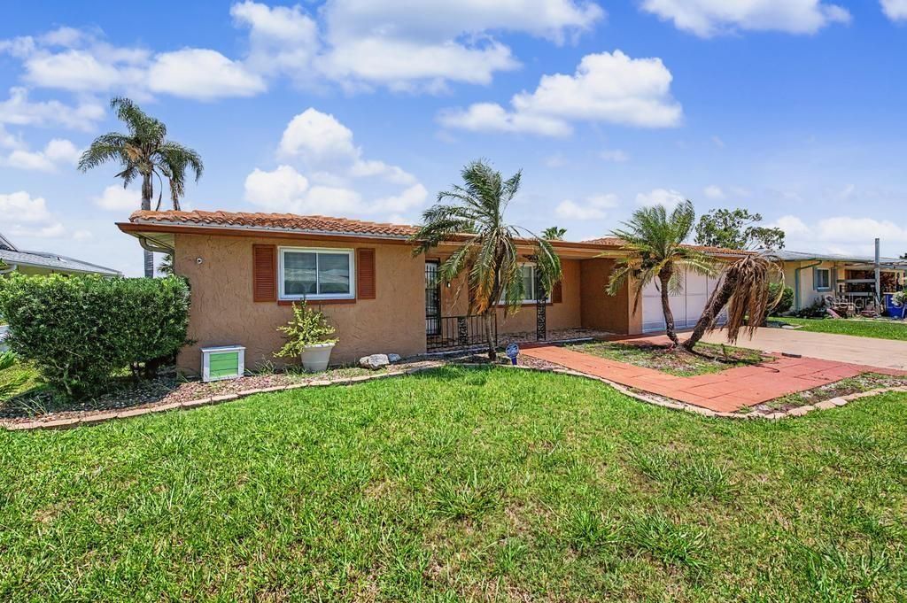 Photo of 3837 Topsail Trail, New Port Richey, FL 34652 (MLS # O6424657)