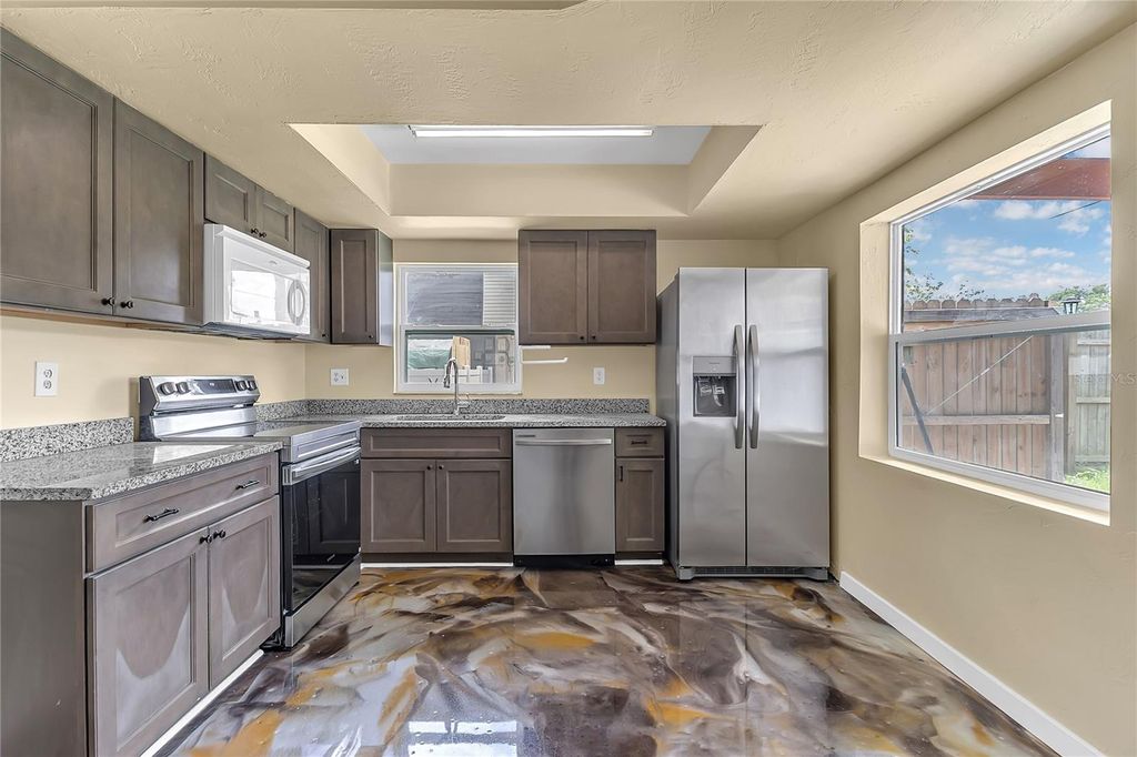 Photo of 36 Springwood Square, Port Orange, FL 32129 (MLS # O6394385)